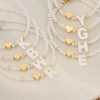European and American cross-border English 26-letter shell beaded bracelet necklace, metal heart design sense bracelet, Amazon details Picture